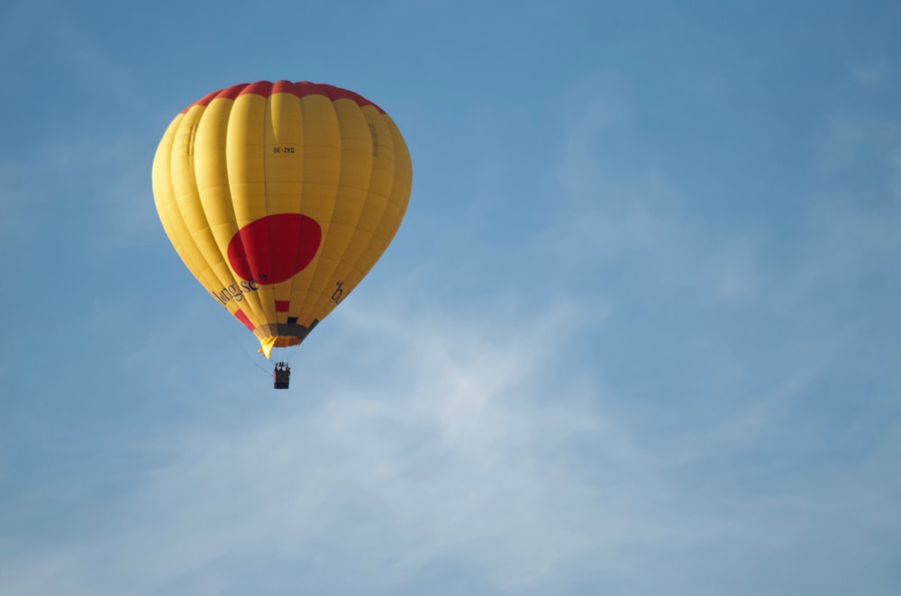 yellow and red hot air balloon