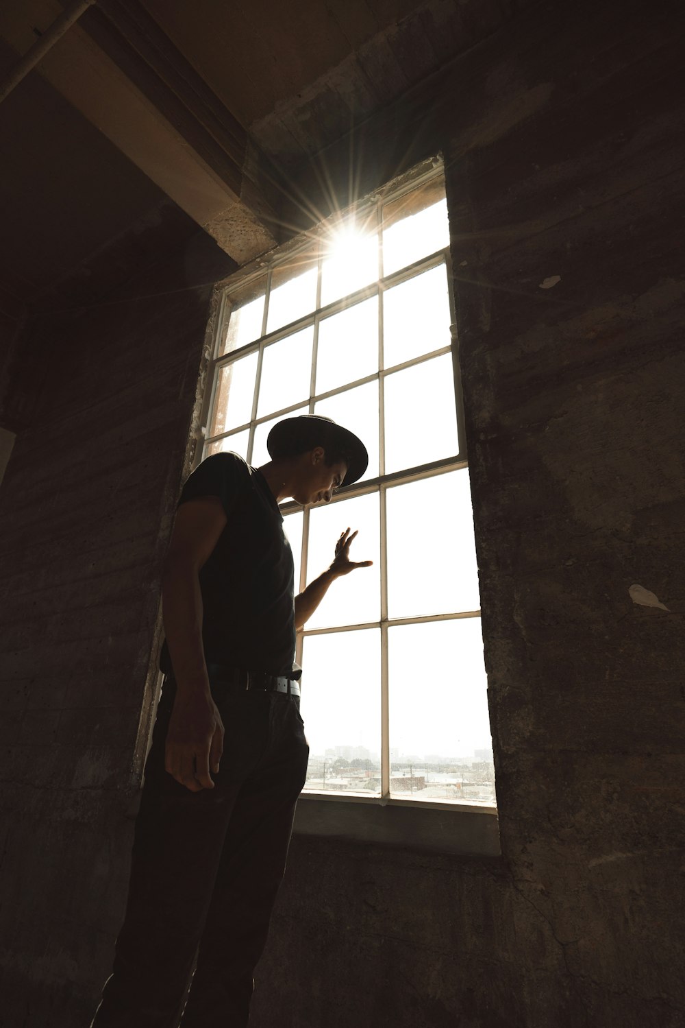 person in front of window