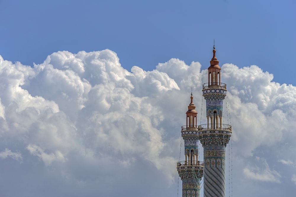 white, blue and orange towers