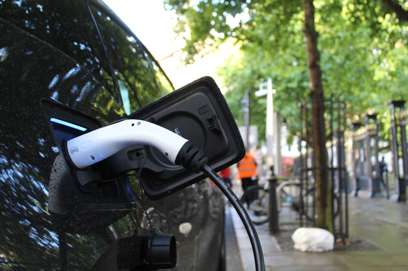 Apartment renter walking past a public charger