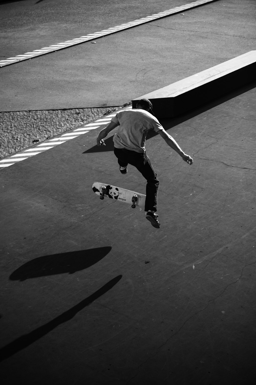 grayscale photography of man skateboarding