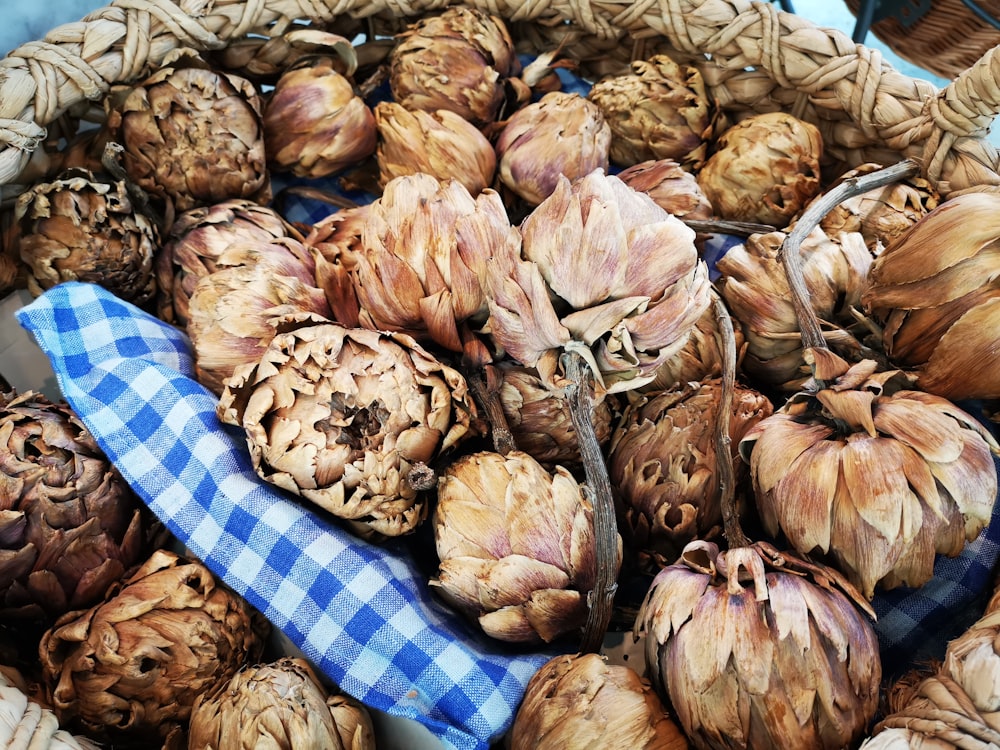 brown fruits inside gray basket