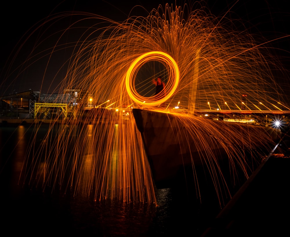 long-exposure photography of fire dance show