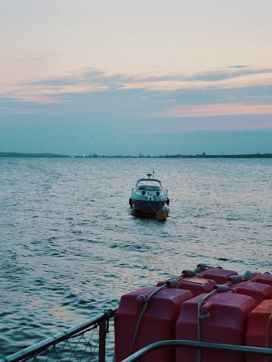 white and gray powerboat on body of water during daytime in St Anastasia Island Bulgaria