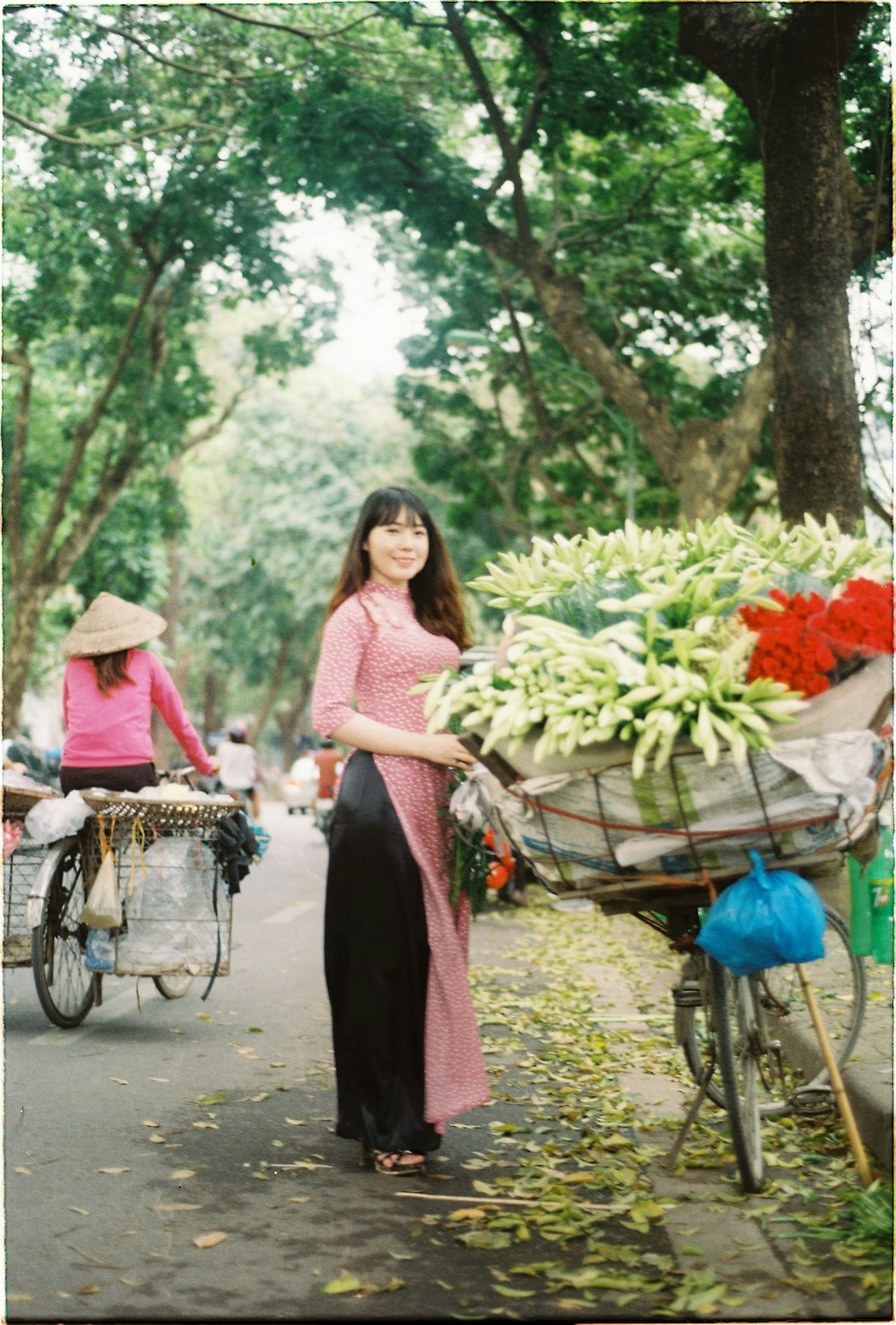 woman near bike on road