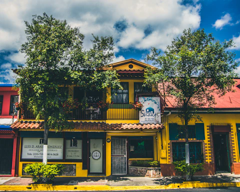 A warm, inviting photo of Navashakti Herbals Hospital’s facade surrounded by greenery.