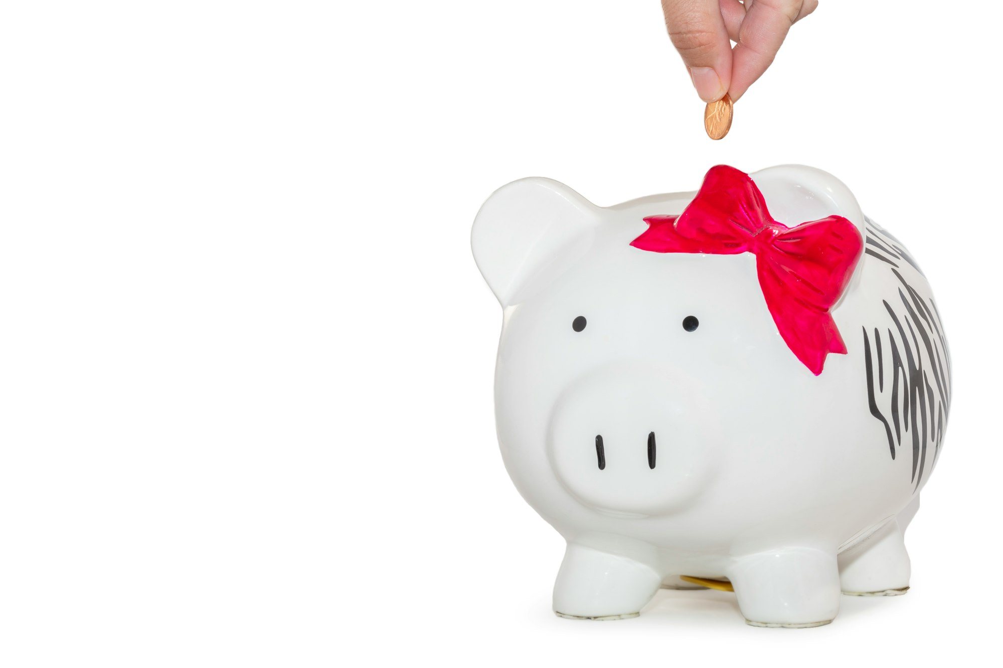 Saving money with a piggy bank