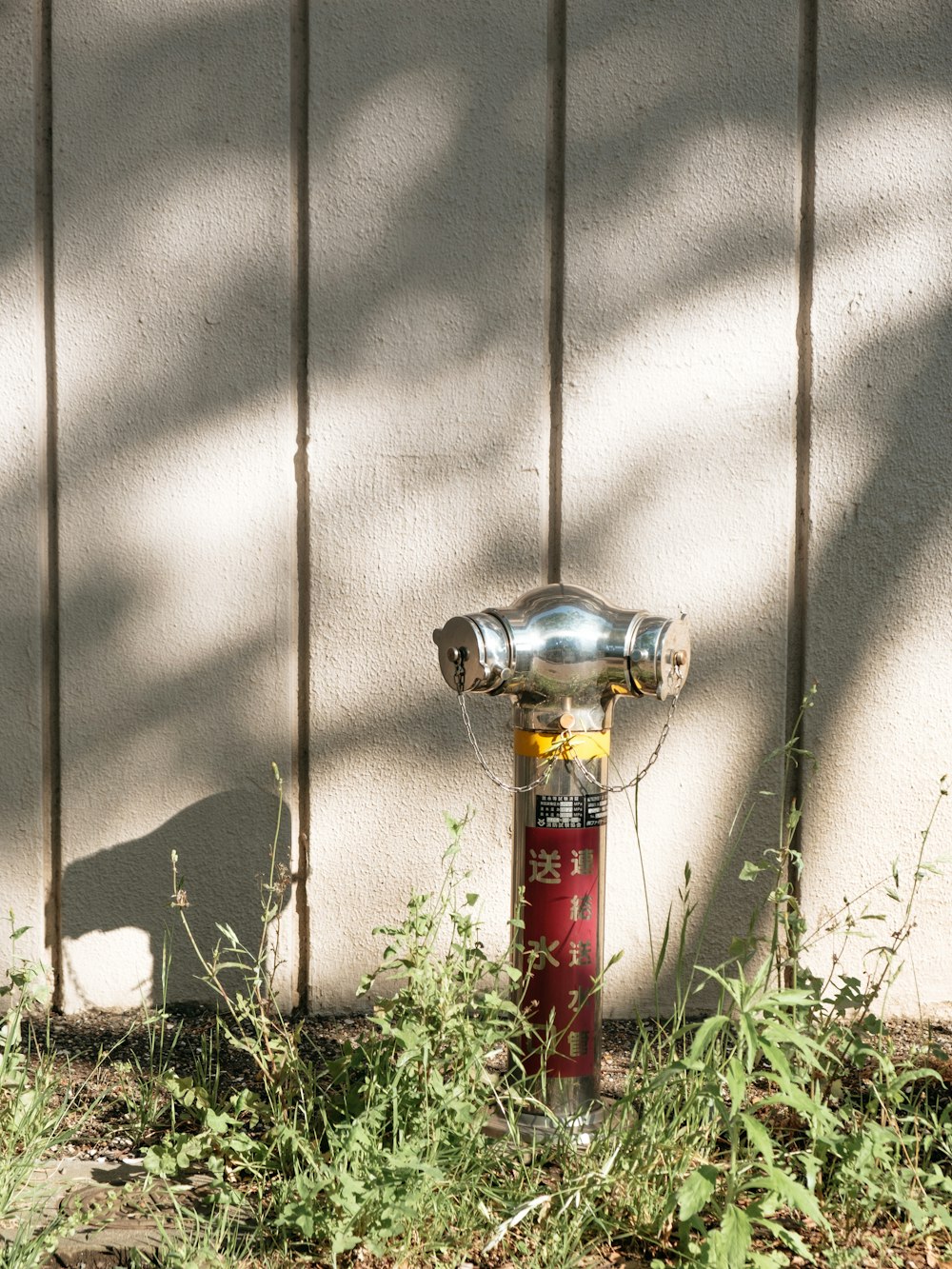 gray and red fire hydrant