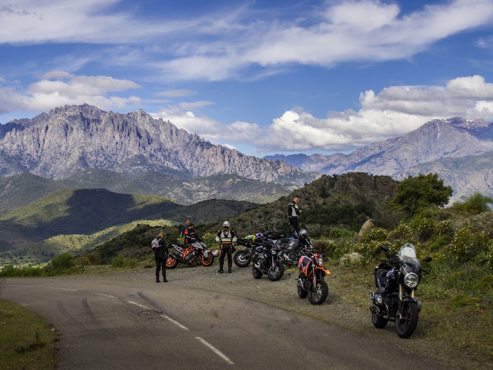 parked motorcycles near hills