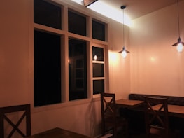 A cozy corner inside the restaurant with rustic decor and inviting wooden tables.