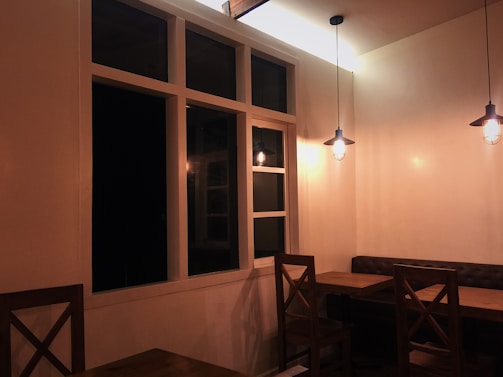 A cozy corner of The Chicken Rice Tustin with warm lighting and a welcoming atmosphere.