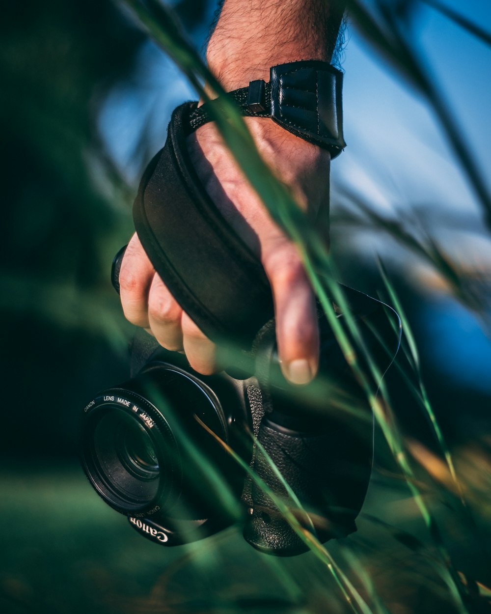 person holding bridge camera