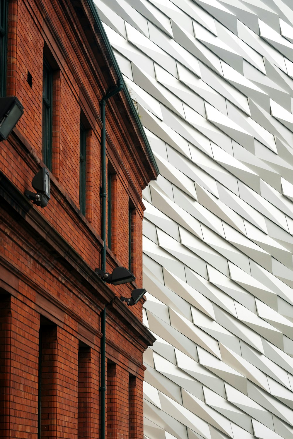 a red brick building with a white roof