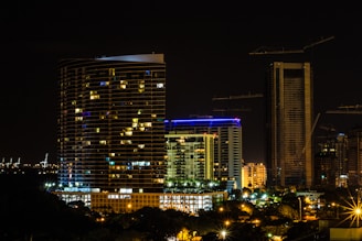 A city skyline with highlighted residential and commercial buildings representing off-market properties.