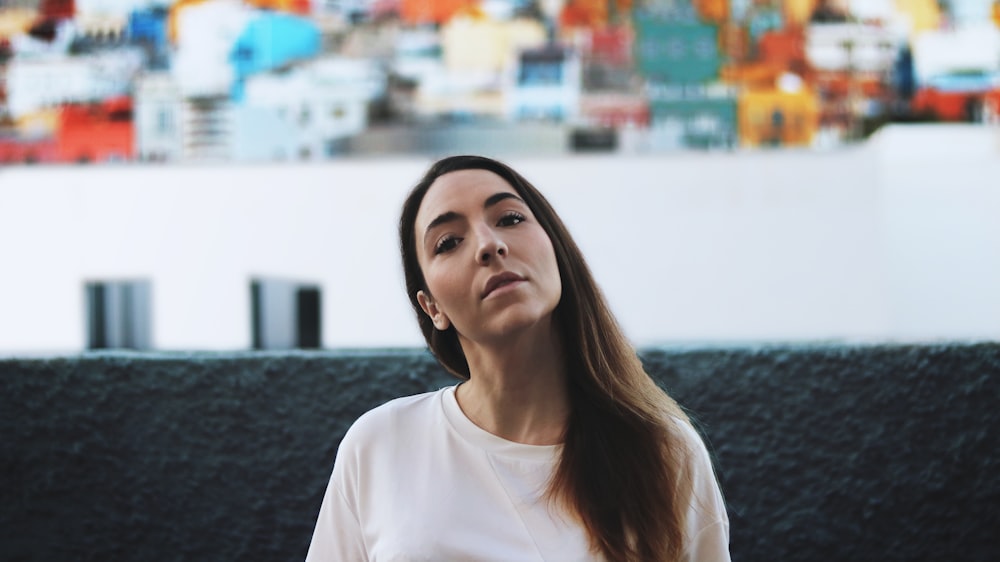 woman wearing white crew-neck t-shirt