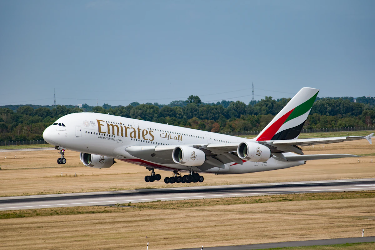 White Emirates passenger aircraft on the ground