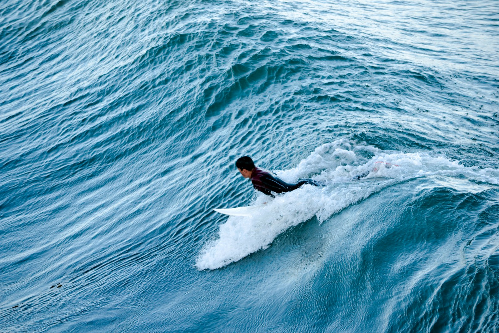 Nikon AF-S DX Nikkor 55-300mm F4.5-5.6G ED VR sample photo. Surfing person photography