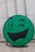 green emoji standee
