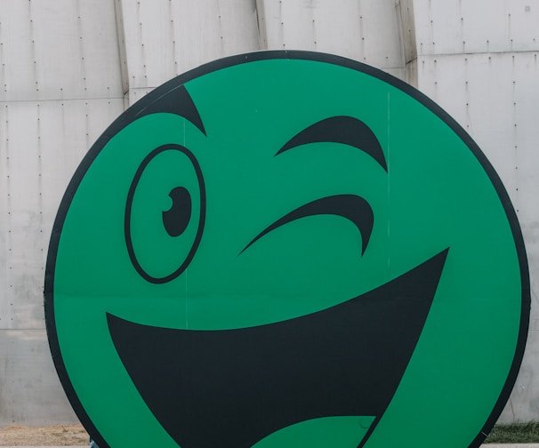 green emoji standee