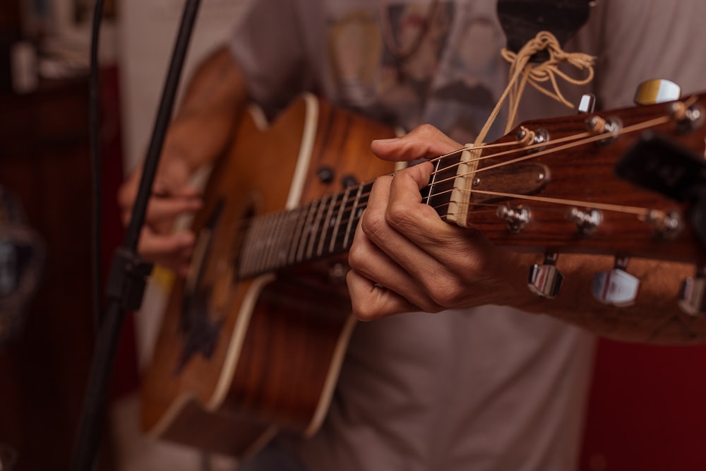 brown acoustic guitar