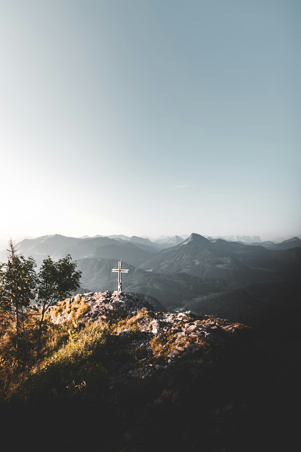 cross on gray rock