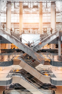 people using escalators