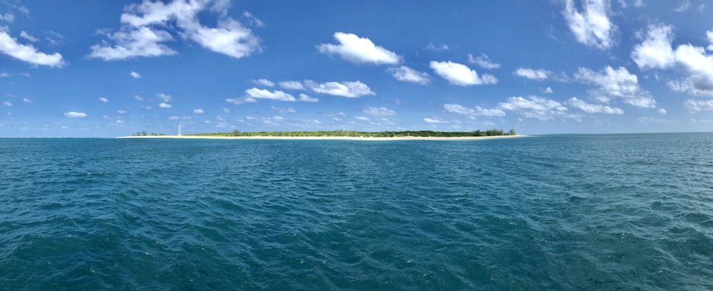 calm body of water during daytime