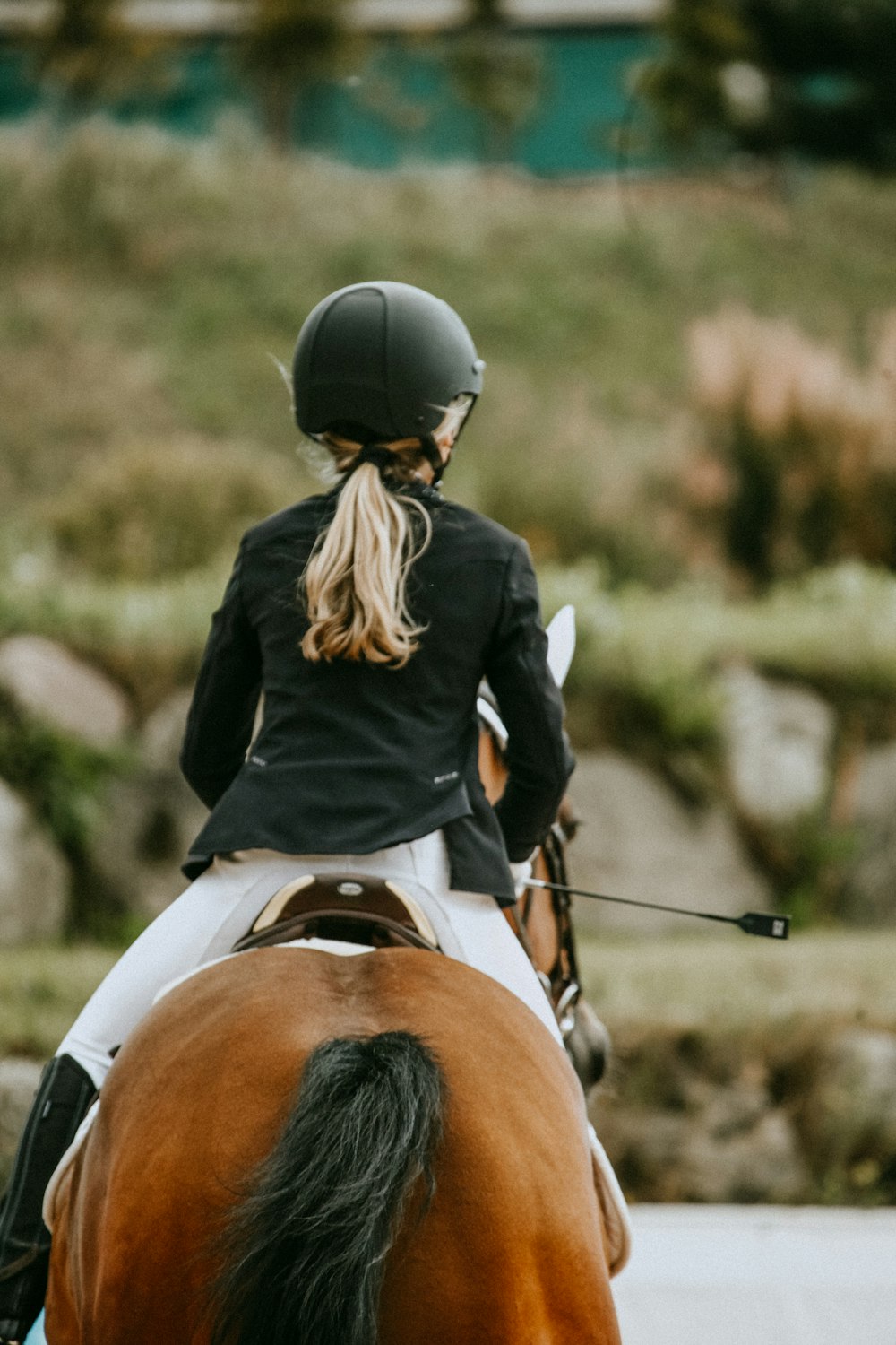 person riding on horse