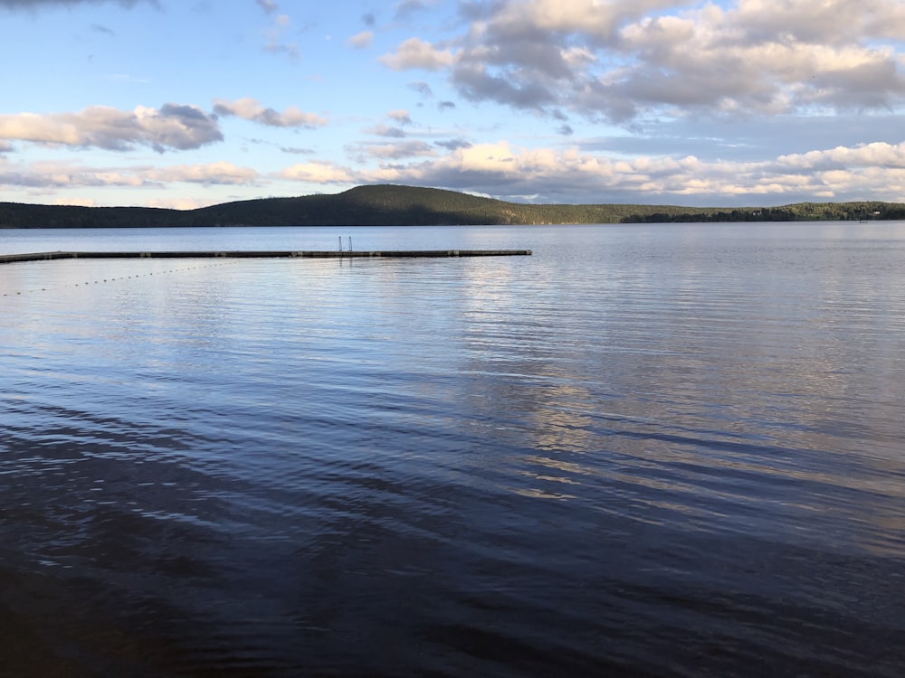 calm body of water during daytime