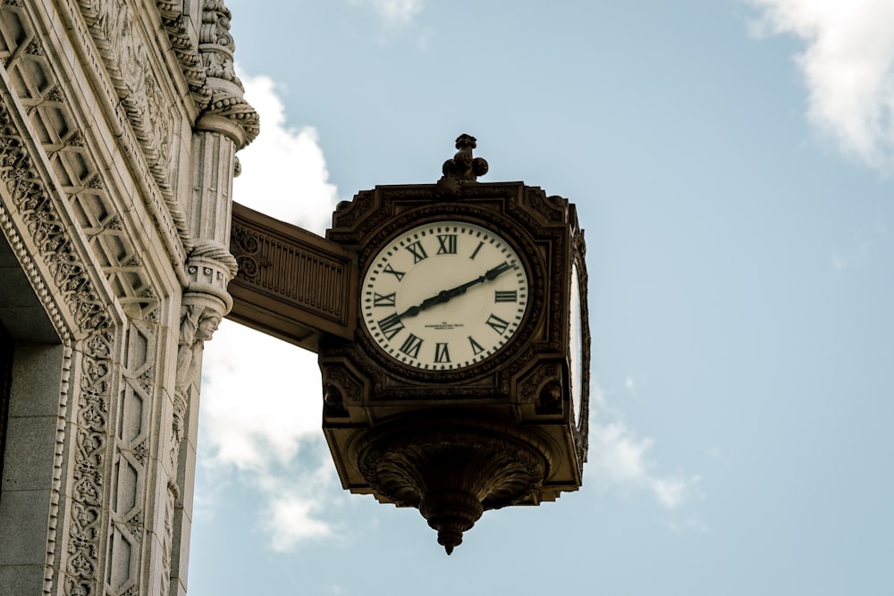 gray and white clock during daytime