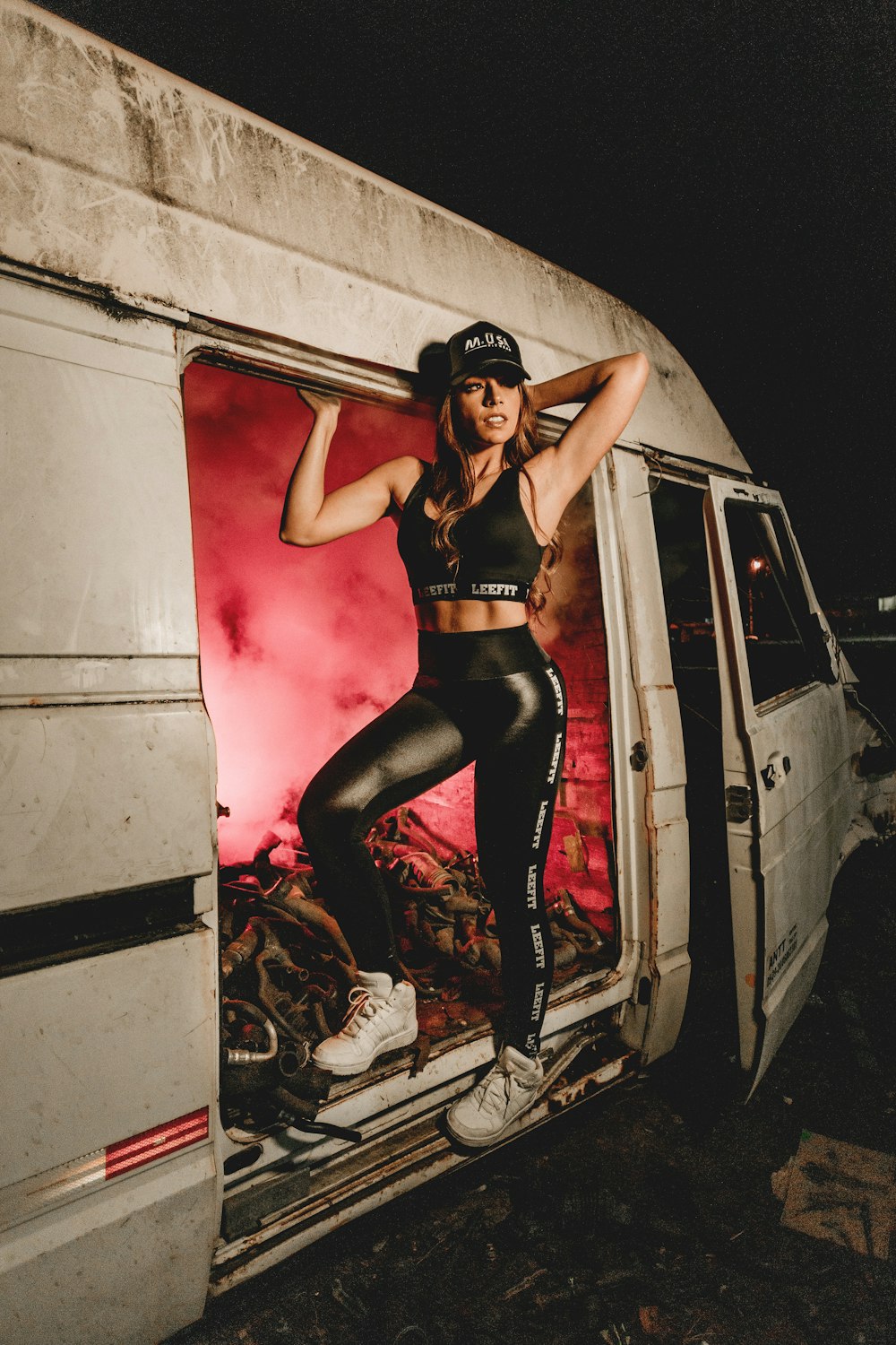 woman standing on van sliding door