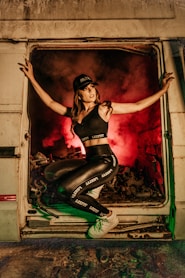 woman sitting on doorway