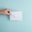 person showing white envelope
