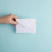 person showing white envelope