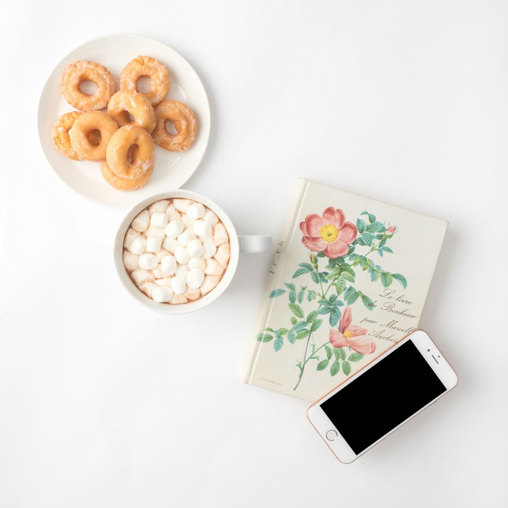flat lay photography of food and book