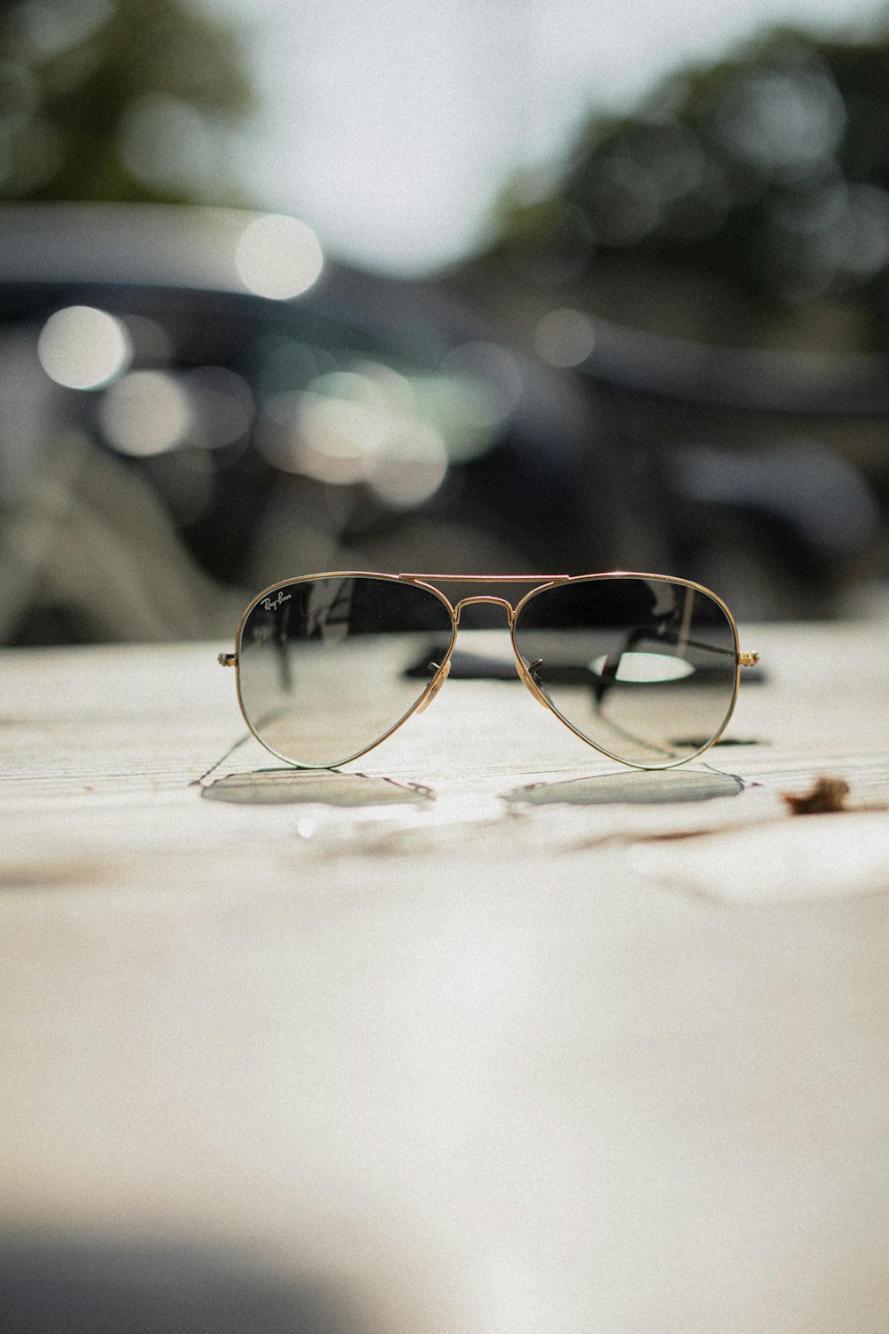 gold-framed Aviator-style sunglasses