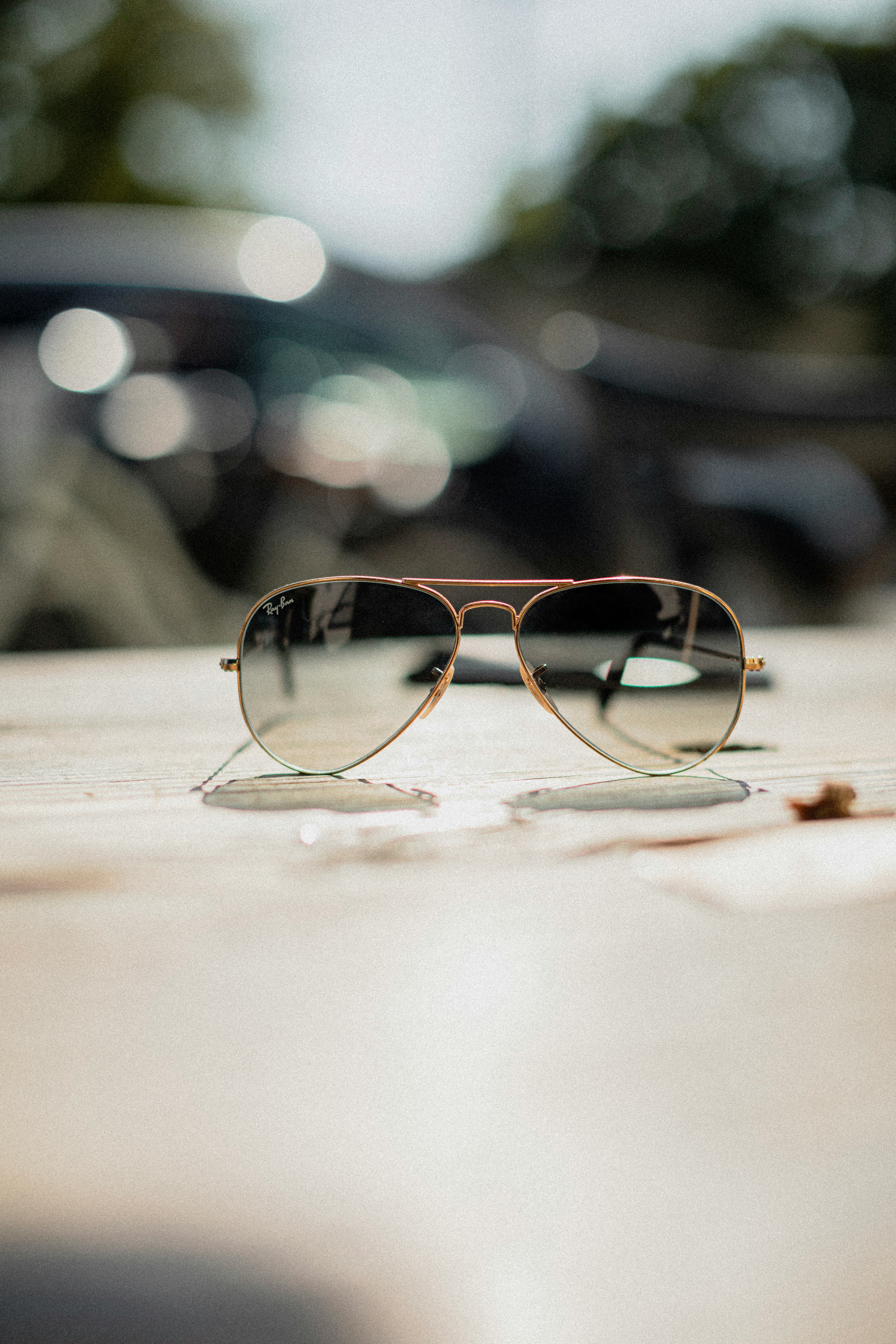 gold-framed Aviator-style sunglasses