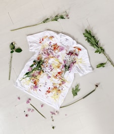 white and red floral textile