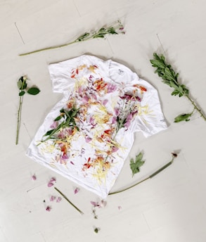white and red floral textile