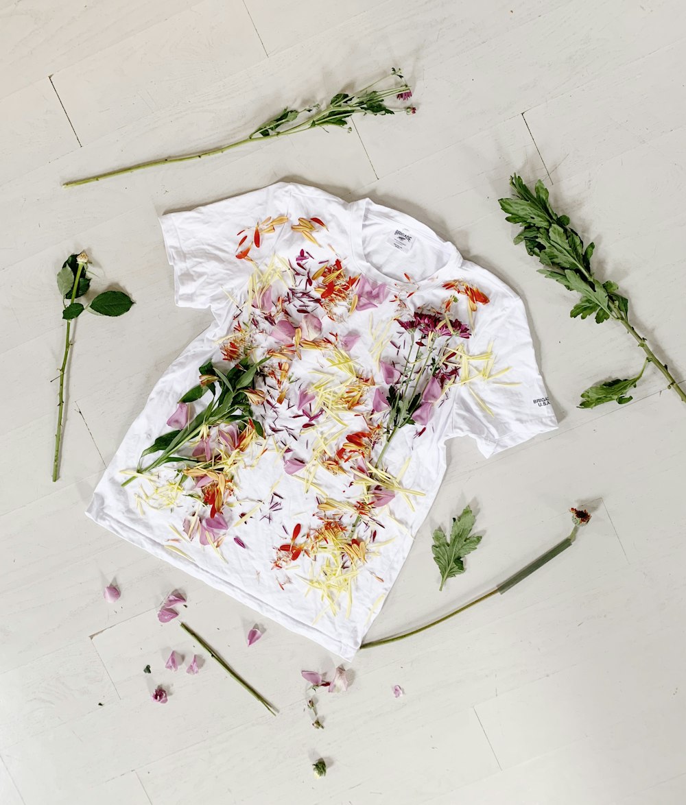 white and red floral textile