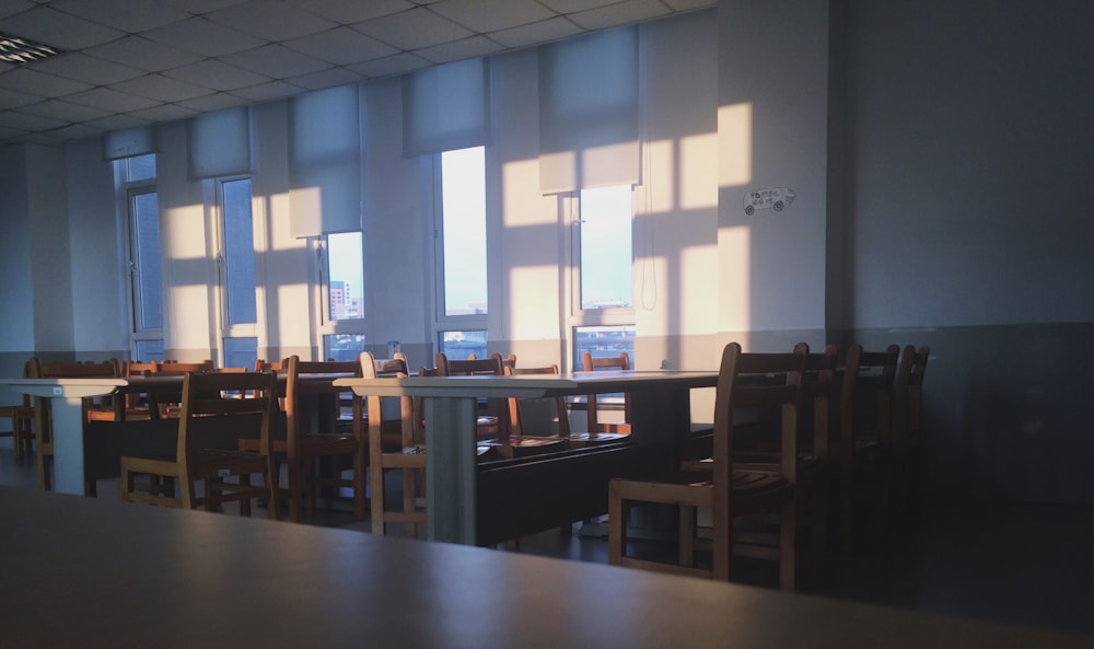 brown wooden chairs and tables