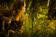 A peaceful scene of a player enjoying a slow-paced simulation game on a sunny afternoon