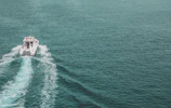 Dynamic marine vessel propelling through water powered by atom motors’ silent electric drive.
