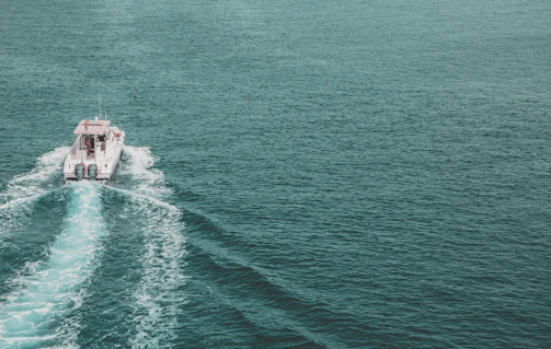 Dynamic marine vessel propelling through water powered by atom motors’ silent electric drive.