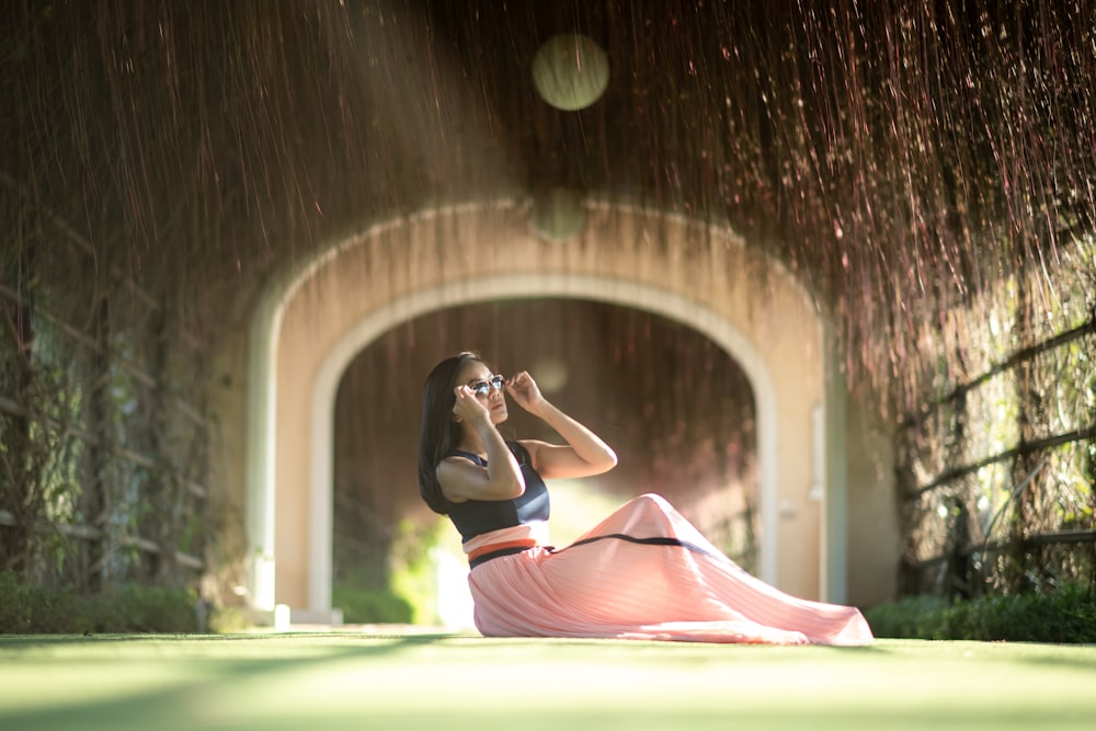 woman sitting on hallway