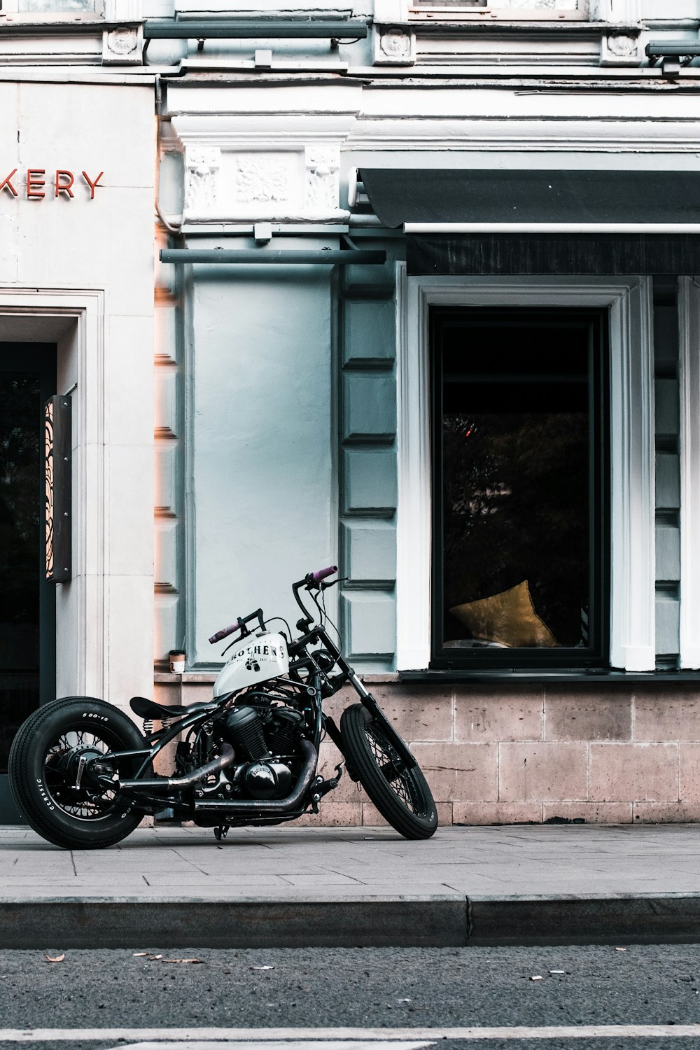 photo of black touring motorcycle