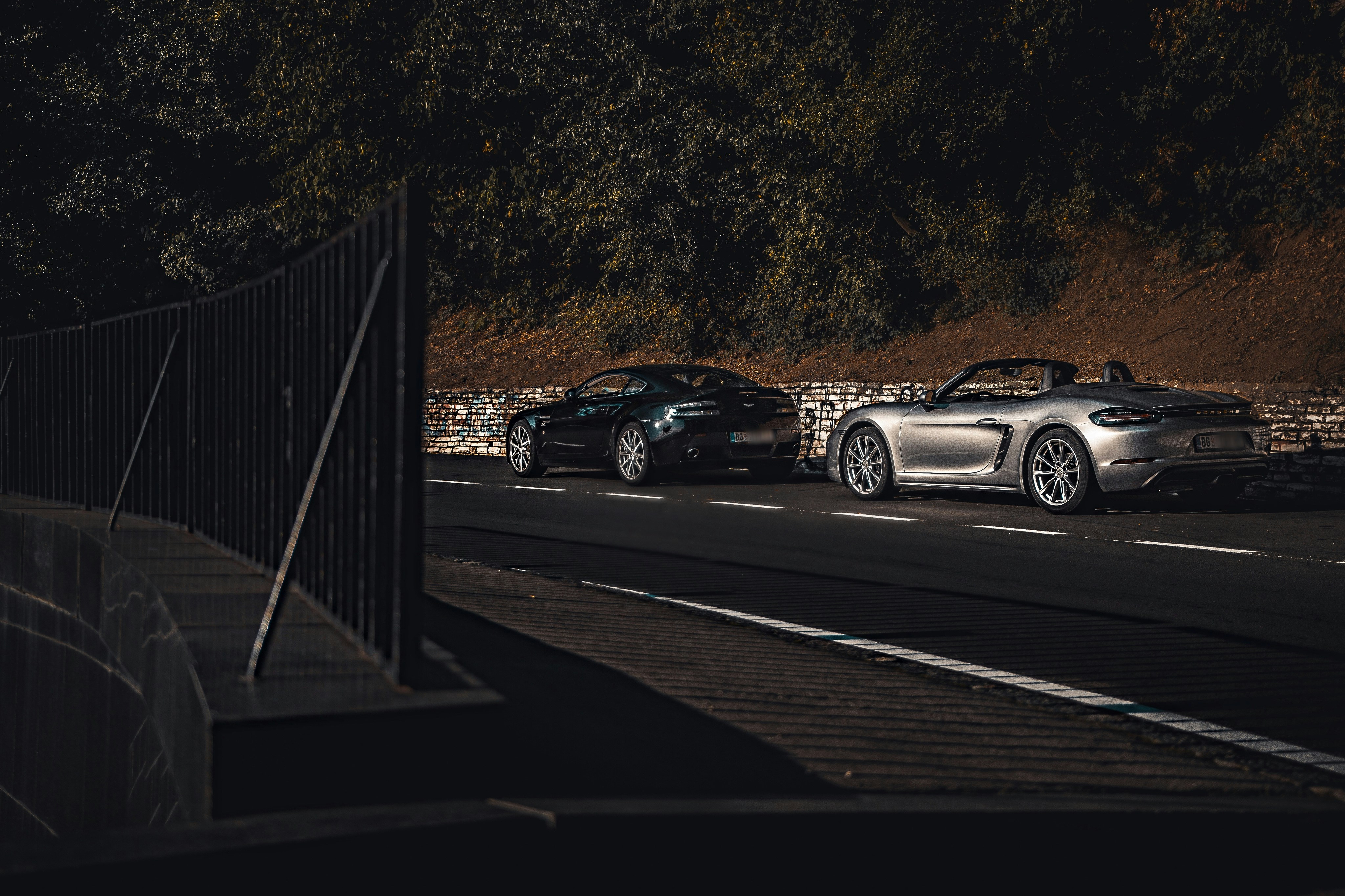 Aston Martin vs Porsche, the photo was taken will cruising with these two beauties near Belgrade. The shot was very spontaneous but the perspective and the light at that moment fitted perfectly.