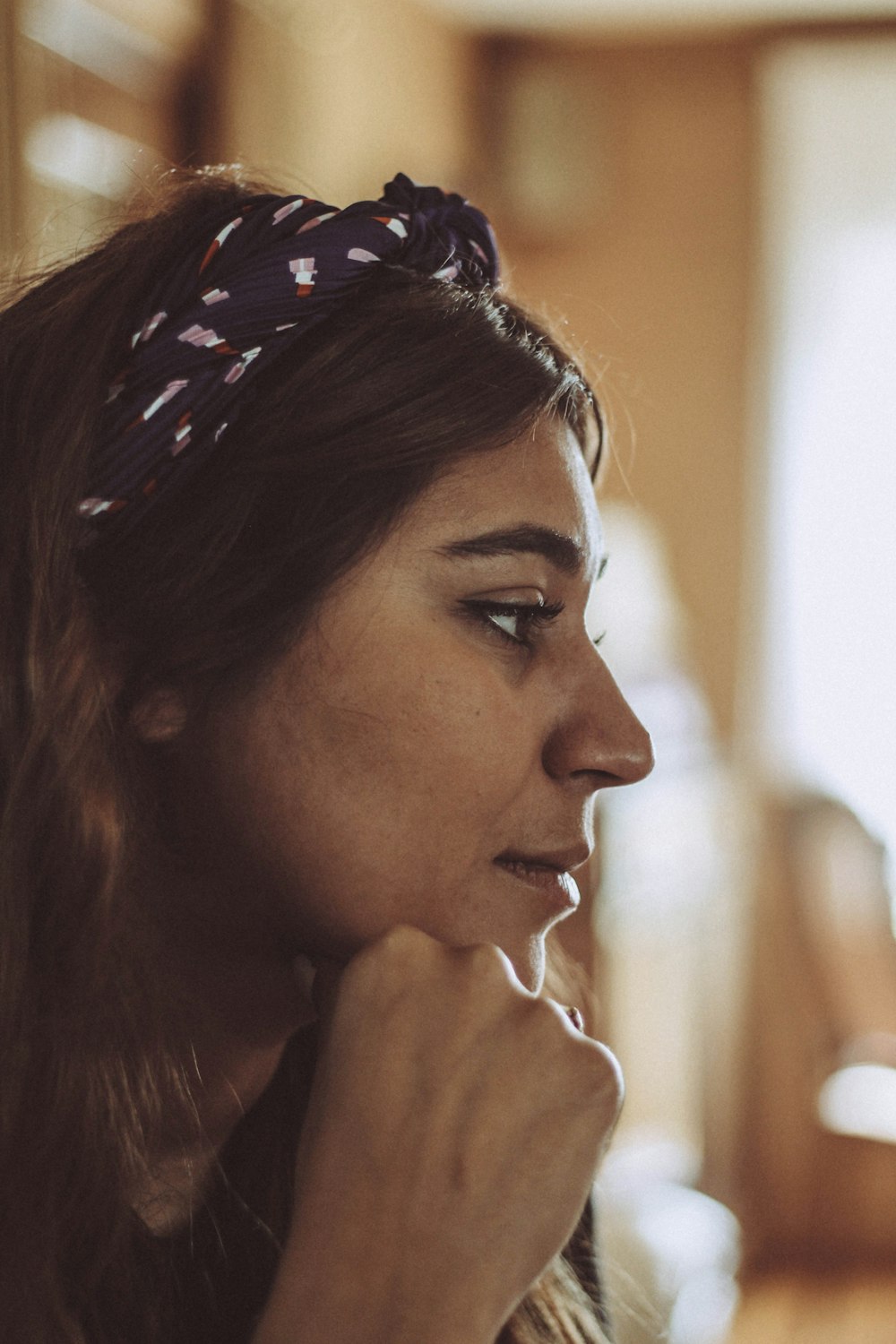 woman wearing black and white headband