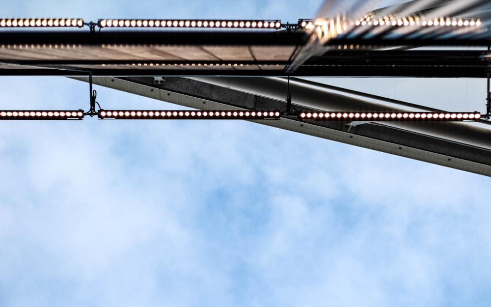 low-angle photography of gray metal bar