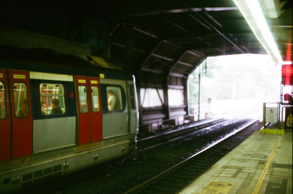 gray and red train